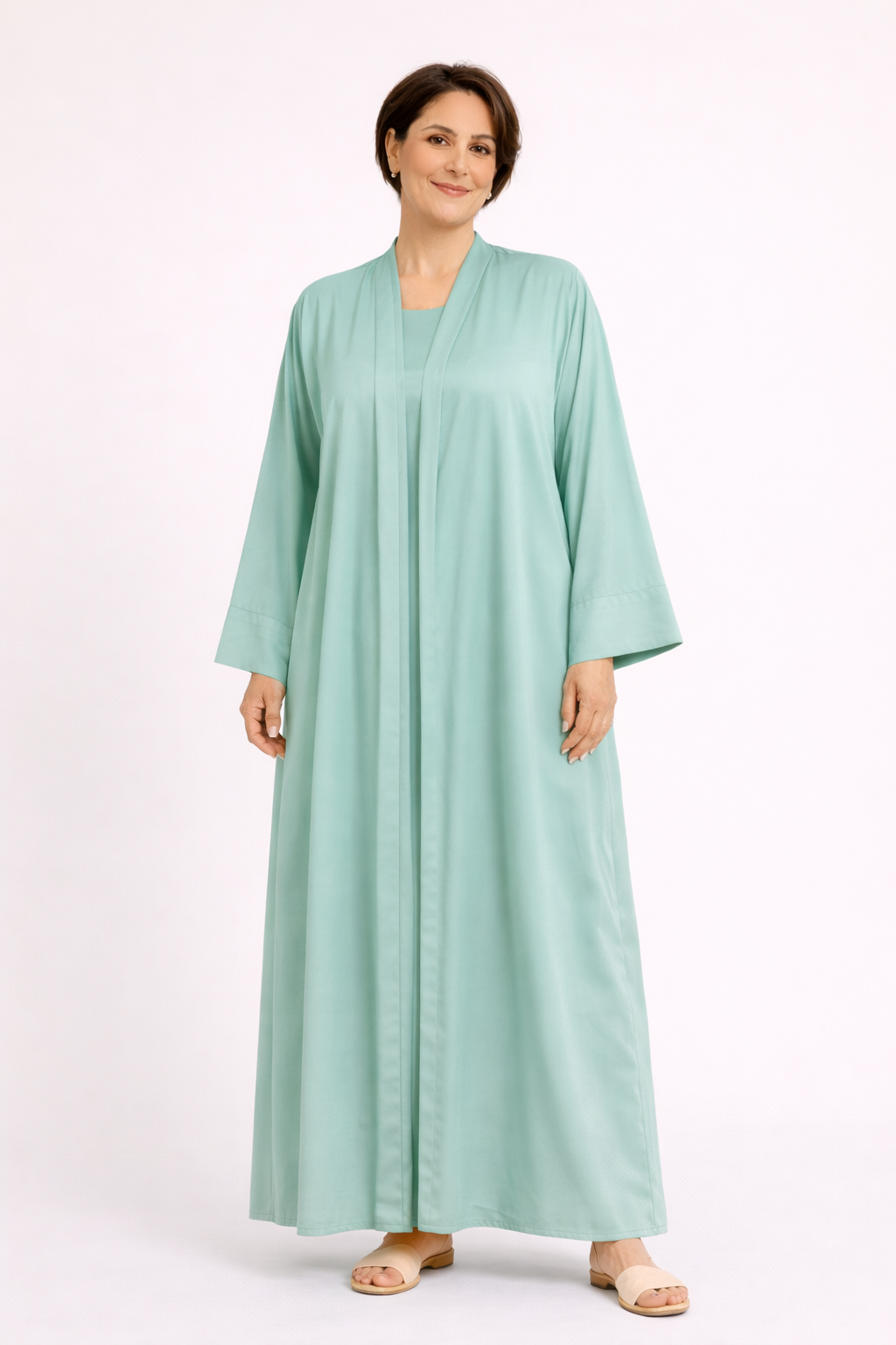 Élégance dans une abaya verte claire Élégance dans une abaya verte claire